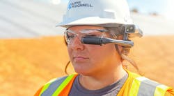 Construction worker with technology glasses AI