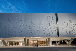 North view of the Brettell Reading Room from the exterior of the O'Donnell Athenaeum Phase I Museum. Partial View, The Sweepers by Wang Shugang. Photo: ©Mauricio Rojas, Courtesy of UT Dallas