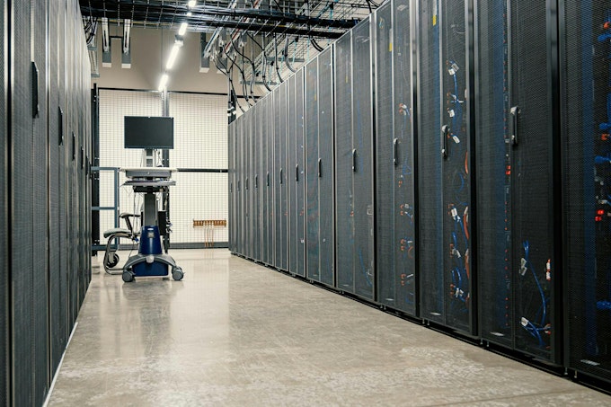 Photo by Brett Sayles, via Pexels: https://www.pexels.com/photo/server-racks-on-data-center-4508751